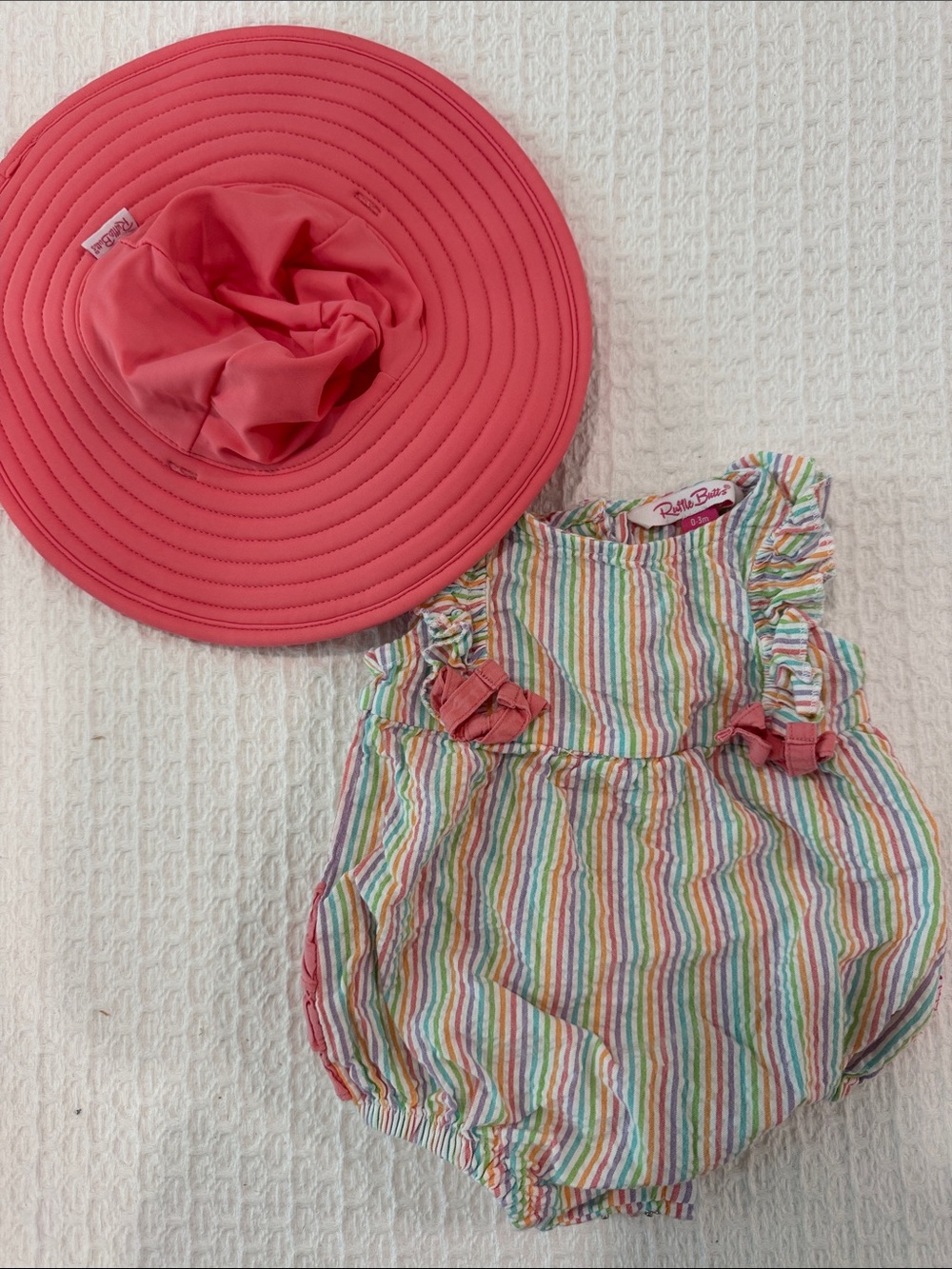 Ruffle Butts Coral Sun Hat with Rainbow Stripe Ruffle Romper
